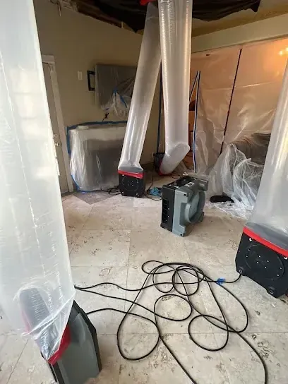 Containment set before drying a lower level in a Rockingham County home