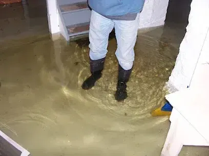 Flooded lower level being cleaned after a Piedmont storm