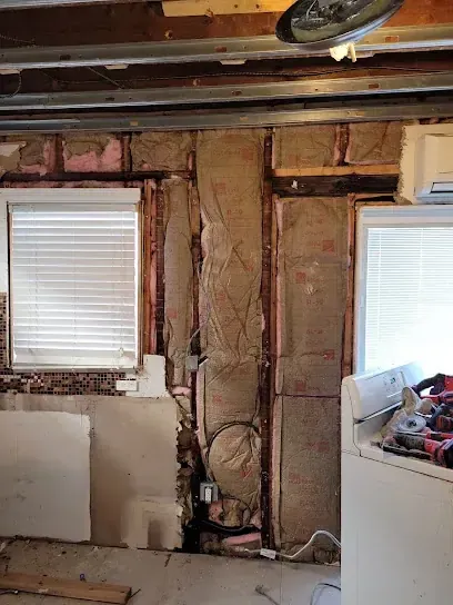 Water heater failure flooding a utility room in Rockingham County